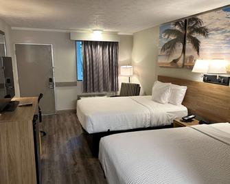 دايز إن باي ويندام سانت أوجاستين آي-95/أوتليت مول - سانت اغوستين - غرفة نوم