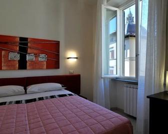 B&B Il Grifone - Pistoia - Makuuhuone
