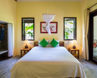 Red Flower Cottages Homestay - Hoi An - Habitación