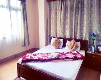 Goroomgo Zimkhang Guest House Gangtok - Gangtok - Bedroom