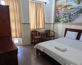 Khach San Nhu Y - Ho Chi Minh City - Bedroom