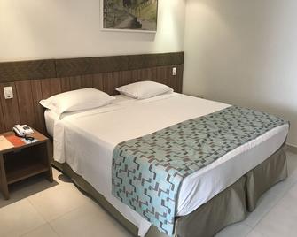 Original Trips - Hotel Turismo - Rio Quente - Schlafzimmer