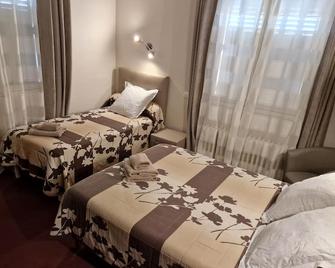 لو فوبورج - فيجاك - غرفة نوم