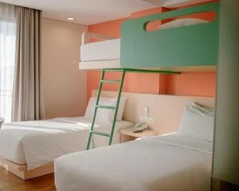 The Bountie Hotel and Convention Centre Sukabumi - Sukabumi - Slaapkamer