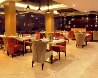 Treebo Tryst Kc Manor - Jamshedpur - Restaurante
