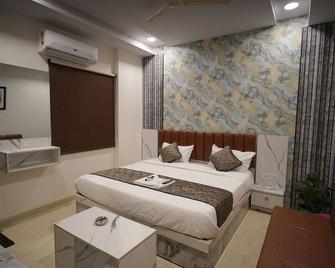 Hotel Jaguar Inn - Nagpur - Bedroom