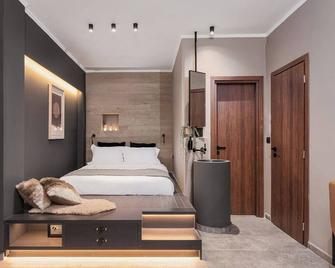 Ermis Suites by GM Luxury Suites Kalavryta - Kalavryta - Bedroom