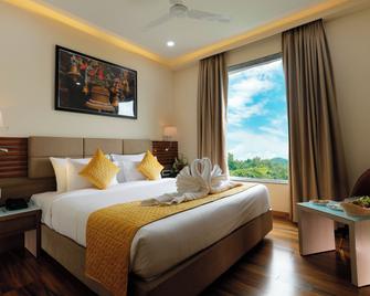 Hotel Dolphin Grand - Varanasi - Yatak Odası