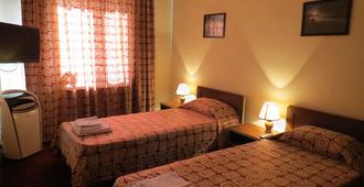 Rohat Hotel Chilonzor - Tasjkent - Slaapkamer