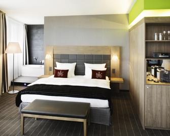 Mövenpick Hotel Stuttgart Airport - Stuttgart - Bedroom