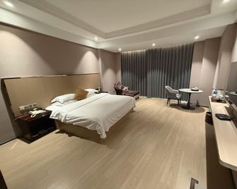 Eastern Kaiyue Business Hotel - Longyan - Habitación