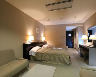Hotel Silk Inn Madarao - Iiyama - Camera da letto