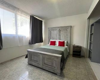 10 Venator House Boutique - León - Camera da letto
