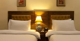 Hotel One Lalazar Multan - Multān - Bedroom