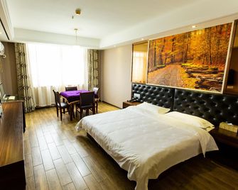 Jichu Chain Hotel Huarong Huarong Avenue - Yueyang - Bedroom