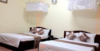 Nam Quang Hotel - Dalat - Schlafzimmer