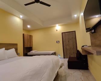 Krazy Rooms - Kaziranga - Slaapkamer
