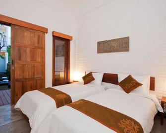 Echoland Boutique Bed And Breakfast - North Kuta - חדר שינה