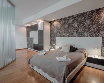 Ushuaia Homes Downtown Apartments - Ushuaïa - Chambre