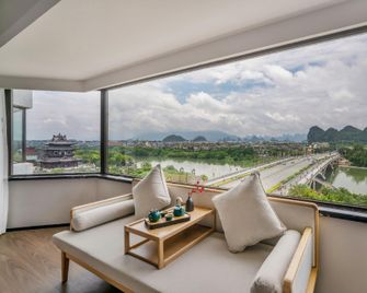 Universal international hotel (Guilin Liangjiang Sihu Elephant Trunk Mountain Branch) - Kuej-lin - Ložnice