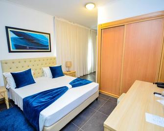 Vivi Hotel - Praia - Schlafzimmer