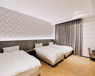 Hoping Mori Hotel - Xiulin Township - Bedroom