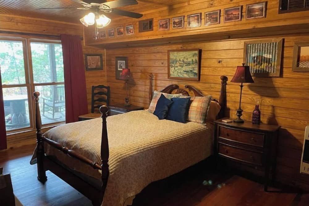 Cabin in the woods overlooking Grenada lake.