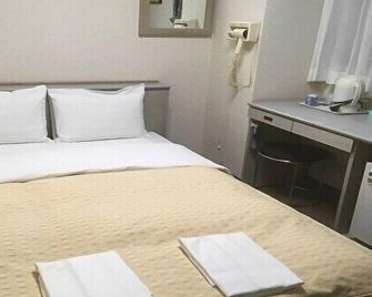 Kasugai Station Hotel - Kasugai - Camera da letto
