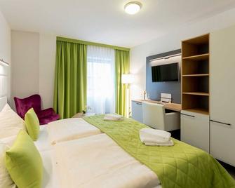 Rooms - Hotel Stadtfeld - Maagdenburg - Slaapkamer