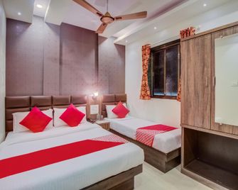OYO Hotel A One Suite Near Chhatrapati Shivaji International Airport - Bombay - Habitación
