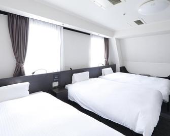 Yokkaichi City Hotel - Yokkaichi - Bedroom