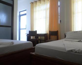 Flamingo Garden Inn & Hotel - Dar es Salaam - Habitación