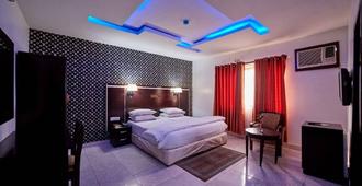 Eemjm Hotels And Suites Limited - Uyo - Bedroom
