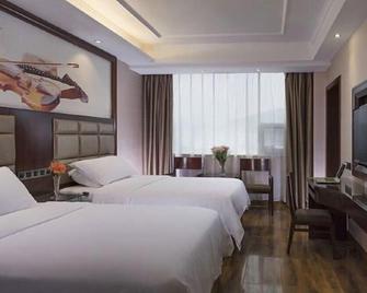 Vienna Zhihao Hotel (Zixing Dongjianghu) - Chenzhou - Schlafzimmer
