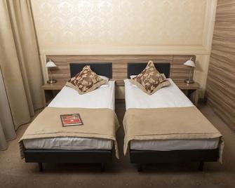 Hotel Iskierka Business & Spa - Mielec - Schlafzimmer