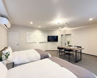 Morimoto Coop by b hotel - Studio Nestled Near Hiroshima Hotspots - Hiroshima - Bedroom