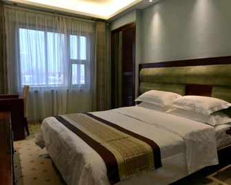Overseas Chinese Hotel (Baoding Swan West Road Branch) - Baoding - Bedroom