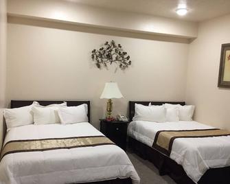 جيسير إن - وست يلوستون - غرفة نوم