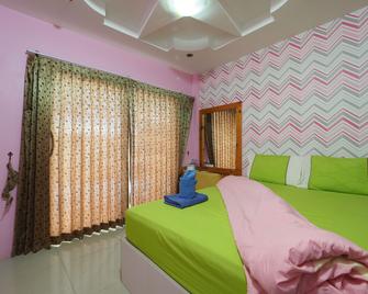 OYO 1100 Chidlom Resort - Ko Lan - Schlafzimmer