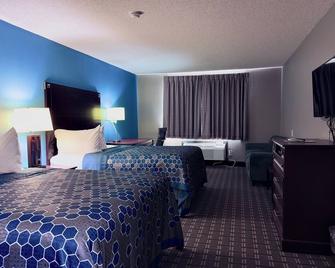American Inn Cedar Rapids South - סידר ראפידס - חדר שינה