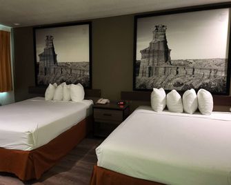 Super 8 by Wyndham Austin North/University Area - אוסטין - חדר שינה