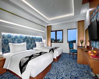 CK Tanjungpinang Hotel & Convention Centre - טאניונג פינאנג - חדר שינה