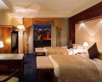 Premier Hotel -Tsubaki- Sapporo - סאפורו - חדר שינה