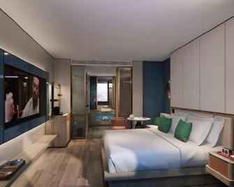 Xichang Lushan Boutique Hotel - Liangshan - Camera da letto
