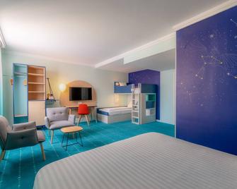 Grand Magic Hotel - Magny-le-Hongre - Schlafzimmer