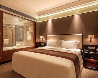 Howard Johnson by Wyndham Jinyi Hotel Chongqing - Chongqing - Living room