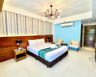 London Beach Resort And Hotel - General Santos - Schlafzimmer