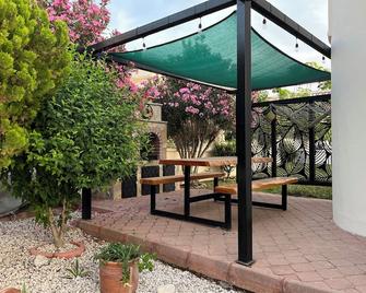 Our villa Magnolia M is on a stunning complex with large L shape pool /childs - Fethiye - Patio