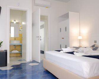 Kalinifta Rooms Apartment - Torre Lapillo - Habitación