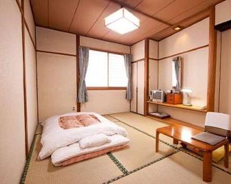 Utsunomiya Riverside Hotel - Utsunomiya - Slaapkamer